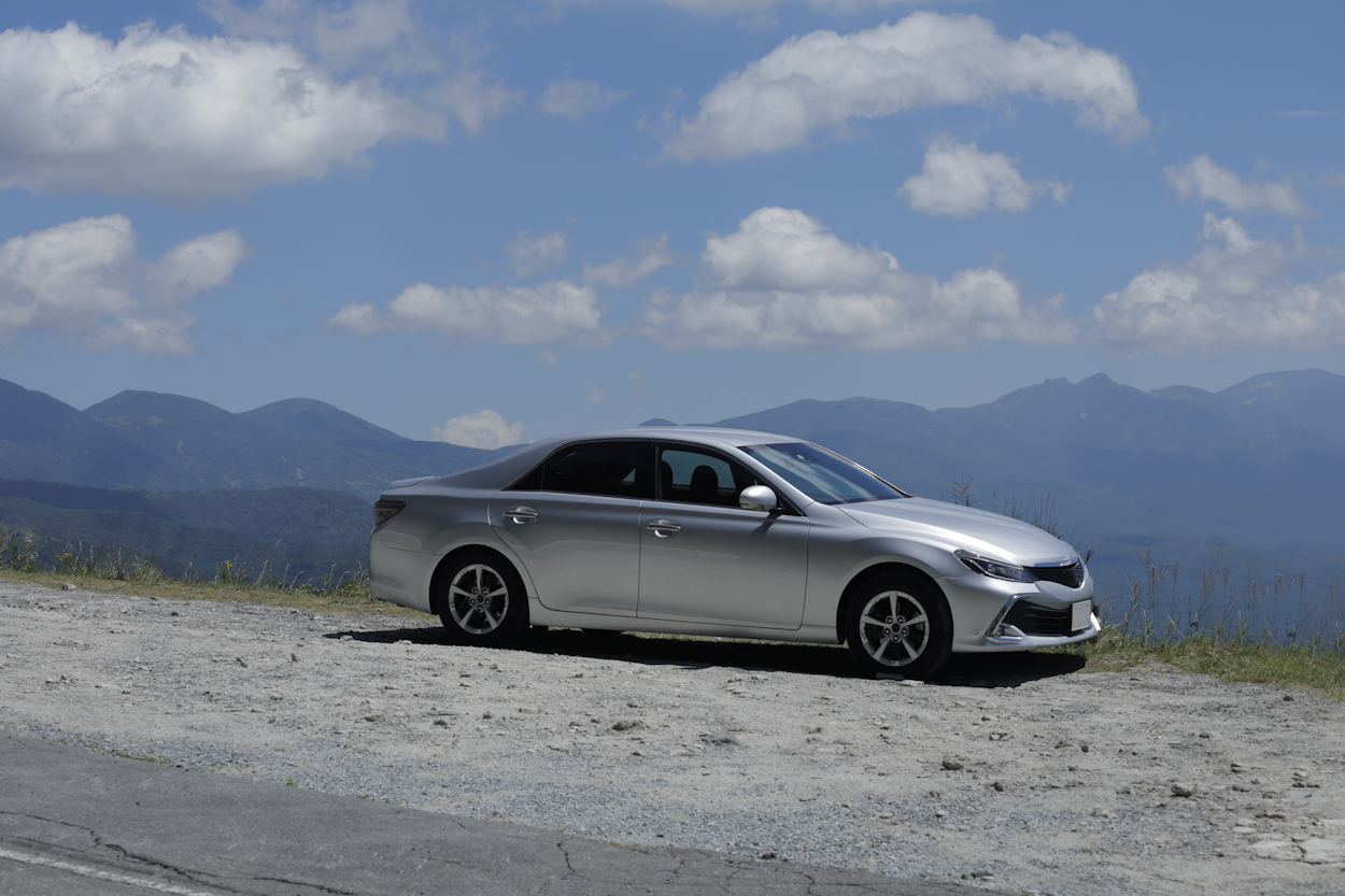 driving car under blue sky